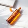 ADAPTASUN Sun Bronz Huile Sèche 3 Soleils - Académie Beauté JT - Esthederm