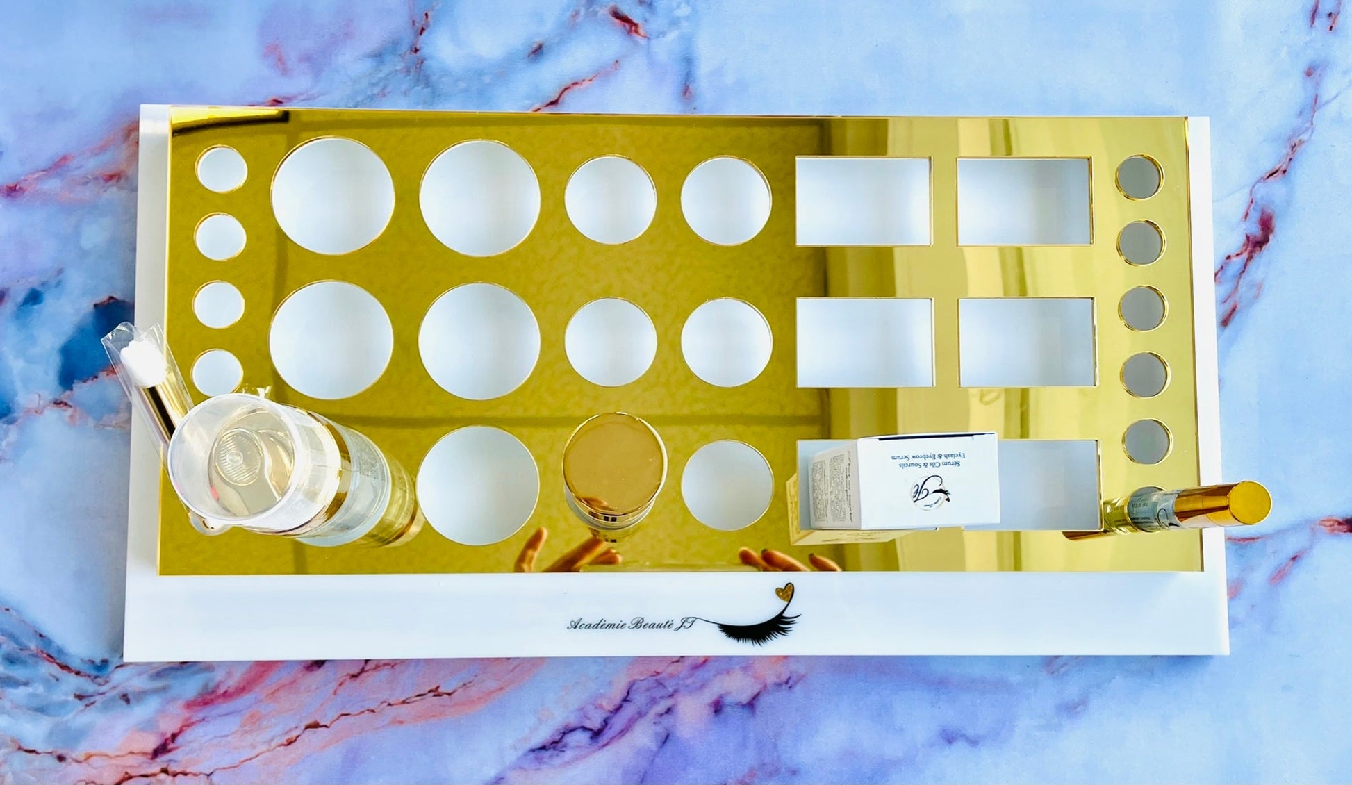 Présentoir luxe Académie Beauté JT avec finition dorée